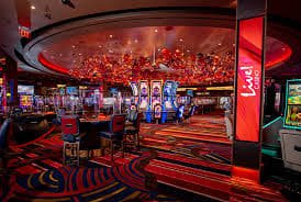 Live dealer table and slot game interface